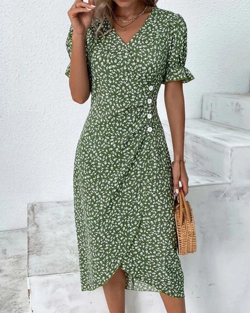 Green v-neck midi dress with white floral print, button front, short puff sleeves