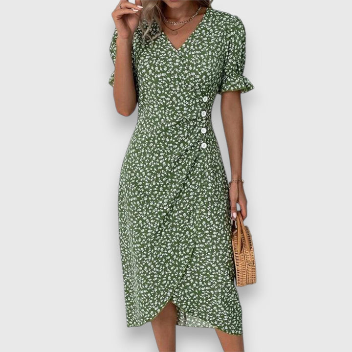 Green floral midi dress with V-neck, ruffled sleeves, and front button detail