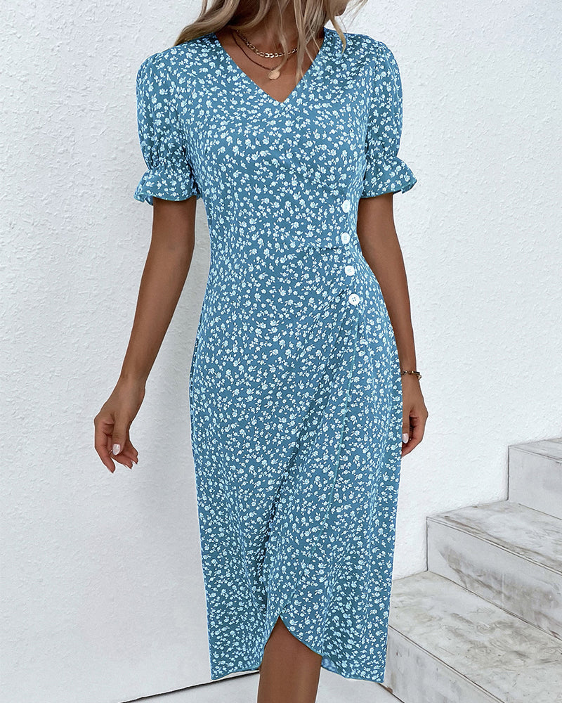Blue v-neck midi dress with white floral print, button front, short puff sleeves