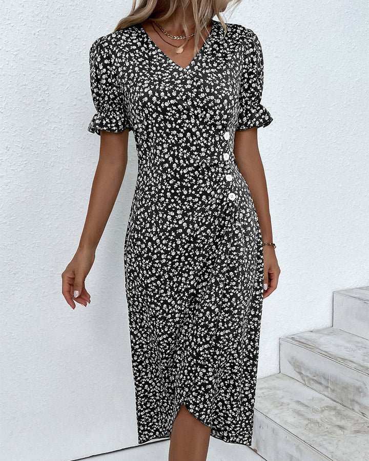 Black floral V-neck midi dress with short puff sleeves and center-front button detail