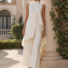White sleeveless tailored set with cascading draped vest and wide-leg pants
