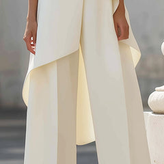 Tailored two-piece set in light cream: sleeveless layered vest top and wide-leg trousers