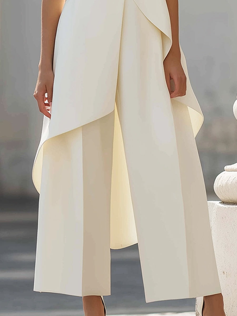 Tailored two-piece set in light cream: sleeveless layered vest top and wide-leg trousers