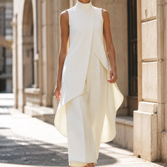 White sleeveless tailored set with draped asymmetric vest and wide-leg pants