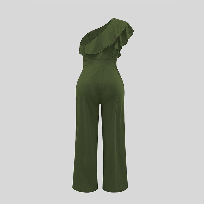 Green one-shoulder jumpsuit with asymmetrical ruffle shoulder and wide legs