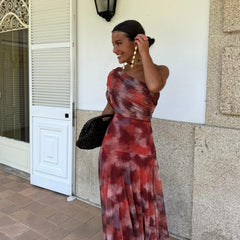Mira off-shoulder long dress, red and mauve tie-dye print, asymmetrical neckline