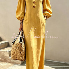 Yellow v-neck maxi dress with button front and lantern sleeves