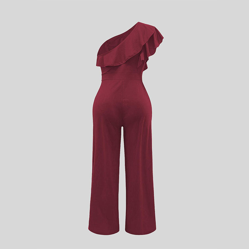 Claret one-shoulder jumpsuit with asymmetrical ruffle shoulder and wide legs