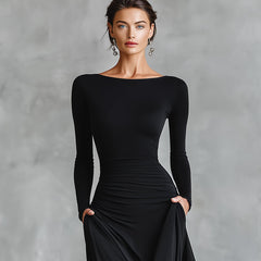 Black long-sleeve maxi dress with round neckline, ruched waist, draped front skirt