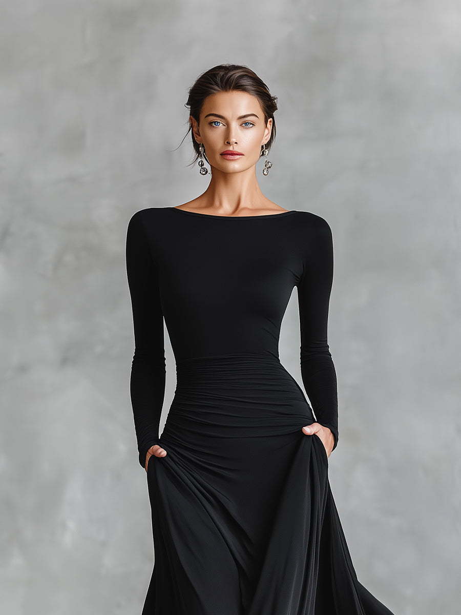 Black long-sleeve maxi dress with round neckline, ruched waist, draped front skirt