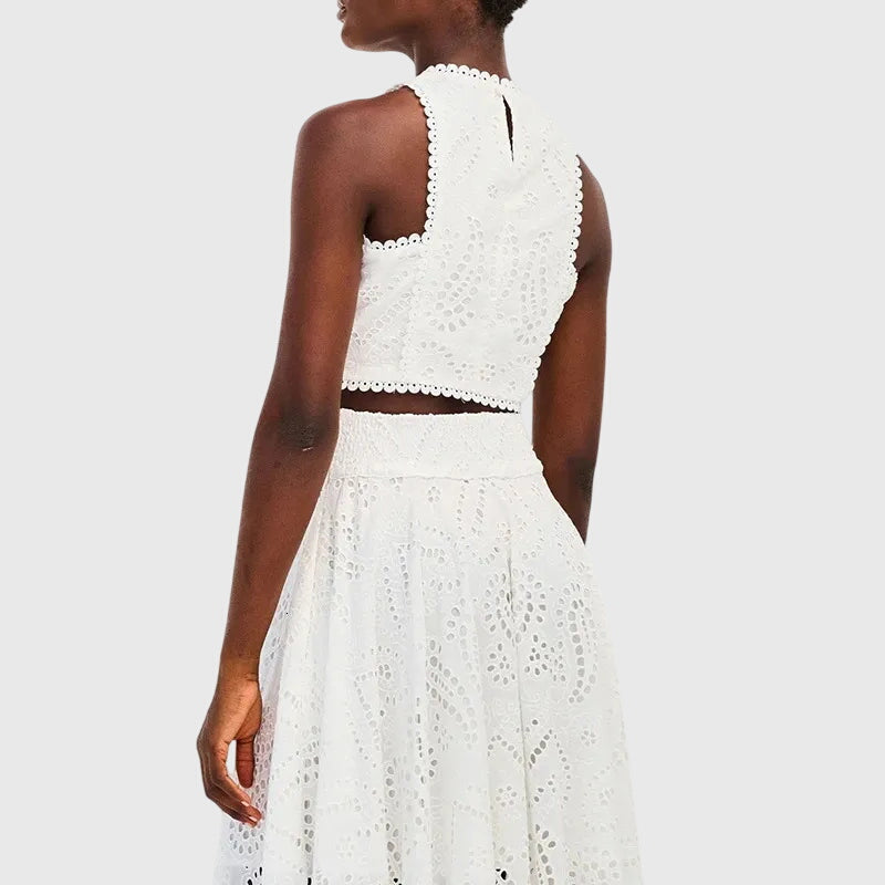 White lace two-piece set with sleeveless crop top and high-back scalloped trim