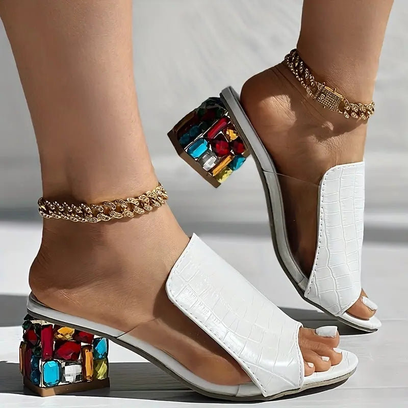 White croc-texture open-toe slide heels with colorful jeweled block heel, front view