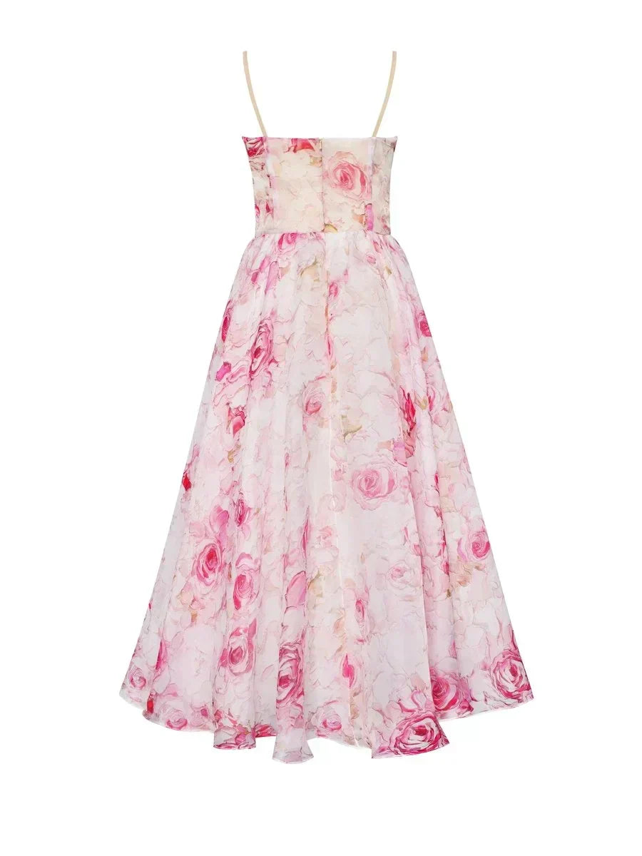 Pink rose print strapless dress with fitted bodice and flared midi skirt