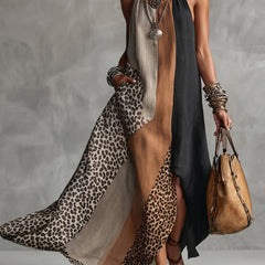 Halter maxi dress with leopard-print panels, dark top and flowing skirt