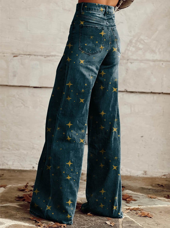 Dark denim boho vintage jeans with gold star print, flared leg and back patch pocket