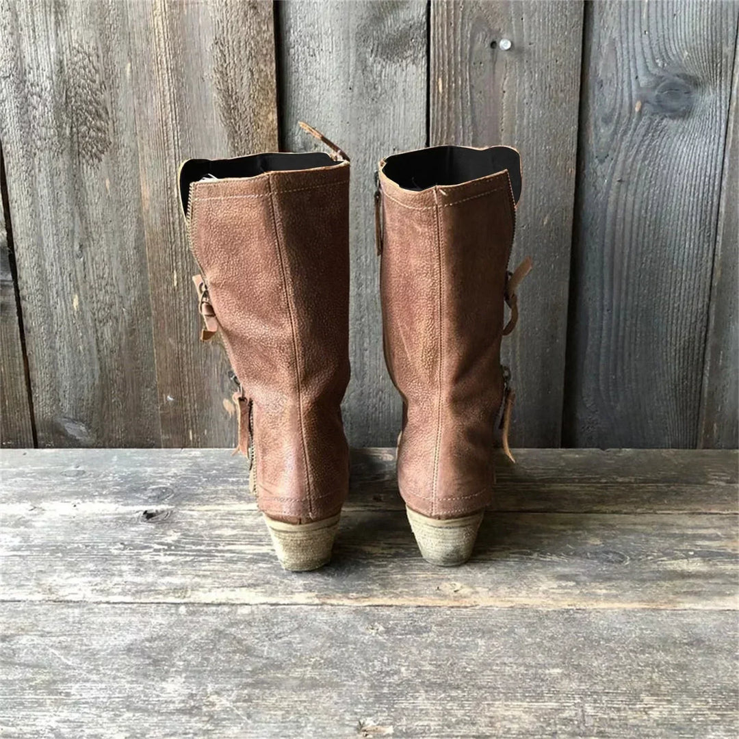Brown tall boots, back view with side zip hardware and stacked heel