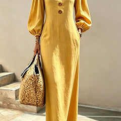 Yellow v-neck maxi dress with button front and lantern sleeves
