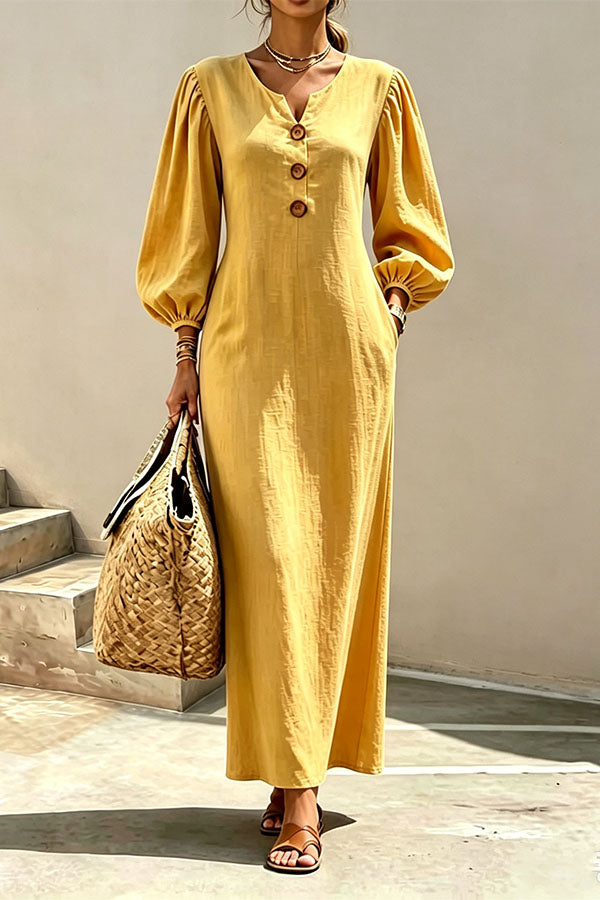 Yellow v-neck maxi dress with button front and lantern sleeves