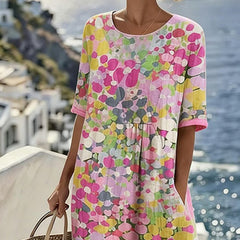 Pink floral midi dress with short sleeves and round neckline, loose gathered waist