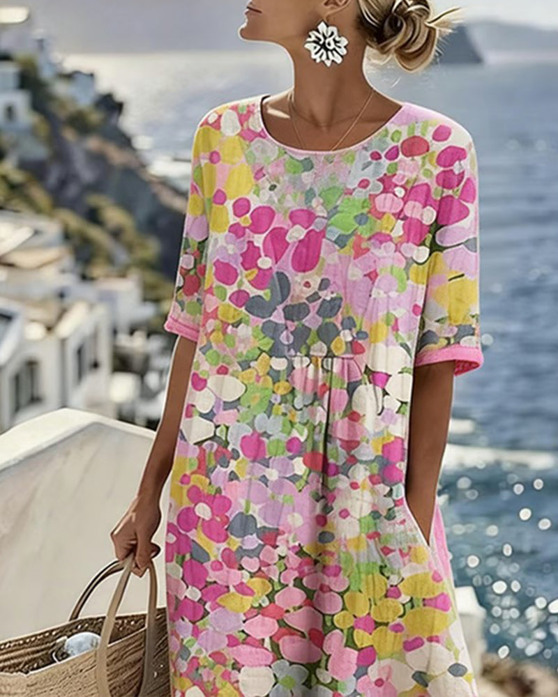 Pink floral midi dress with short sleeves and round neckline, loose gathered waist