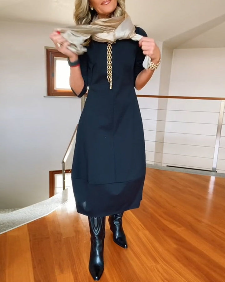 Nia casual elegance dress, dark color, midi length, round neckline, three-quarter sleeves