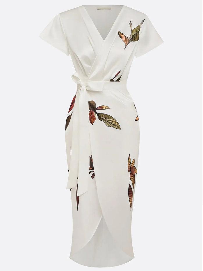 White midi wrap dress, short sleeves, tie belt, scattered bird and leaf pattern