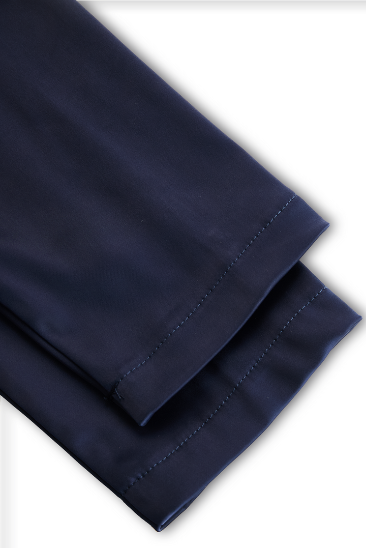 Navy midi dress cuff and hem with stitched edging, folded detail