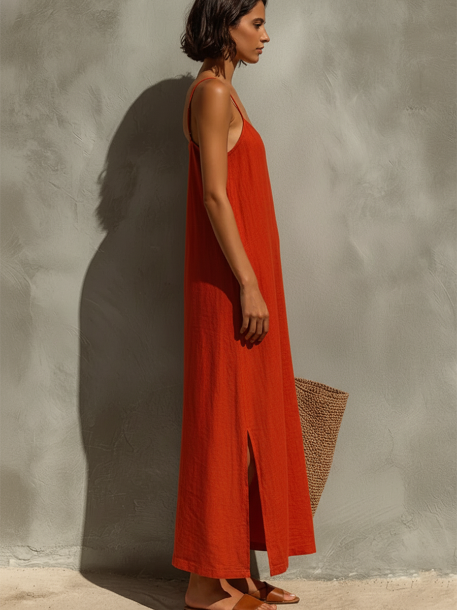 Red sleeveless midi dress with square neckline, thin straps, and front slit at hem