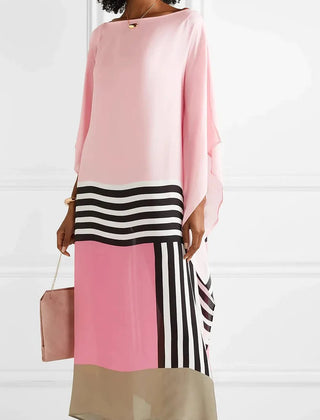 Regan pink kaftan with black-and-white striped band and color-blocked hem