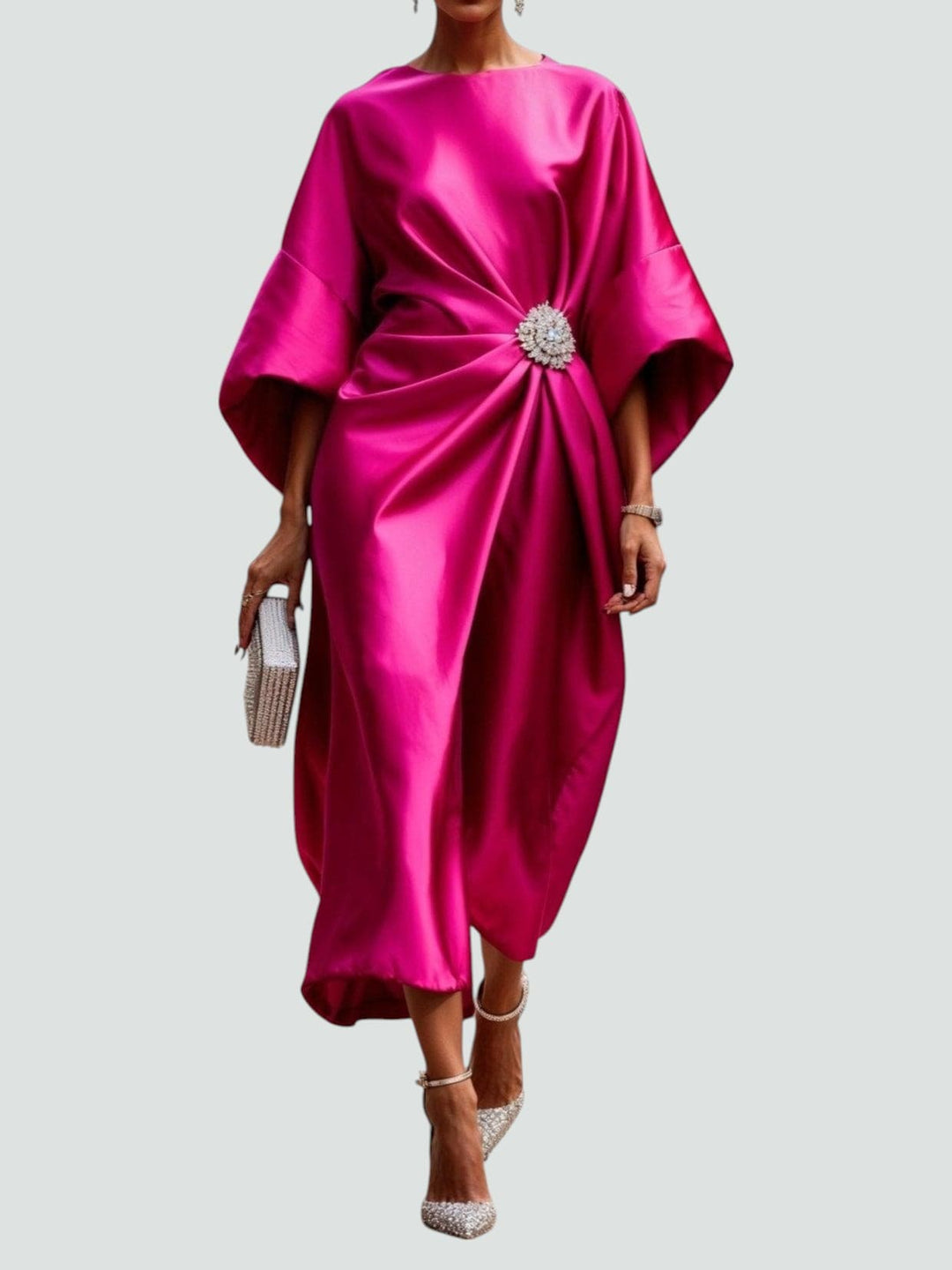 Fuchsia satin midi dress with dolman sleeves and jeweled waist brooch