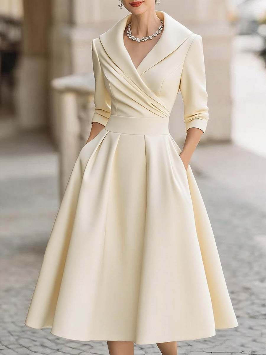 Beige midi dress with V-neck wrap bodice, 3/4 sleeves, and full pleated skirt