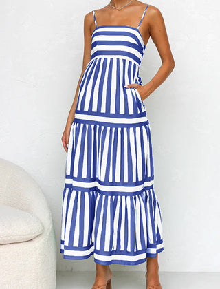 Navy and white striped maxi dress with tiered ruffle layers and spaghetti straps