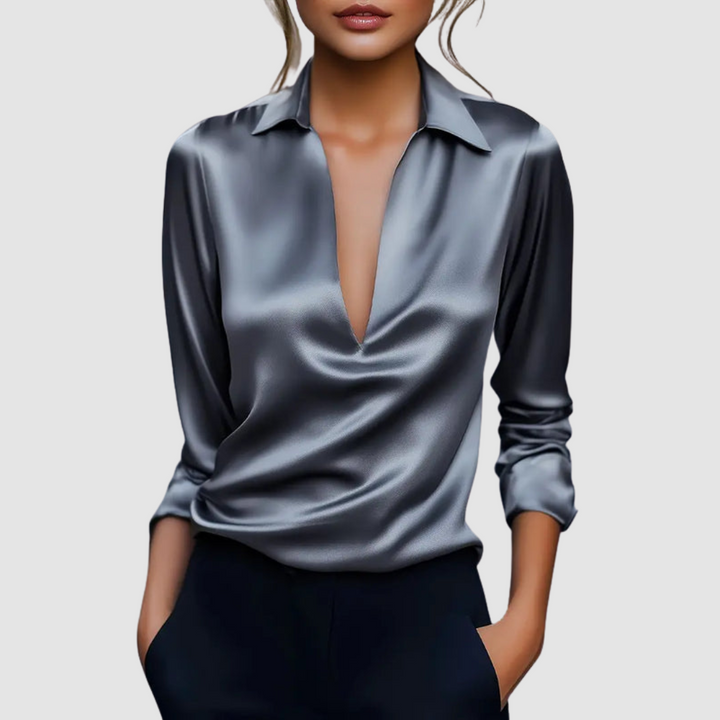 Silver-blue satin blouse with collared deep V neckline and 3/4 roll-tab sleeves