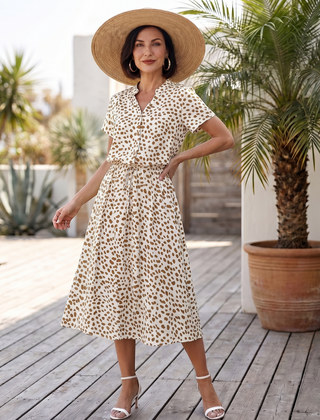 White printed button-front belted midi dress with short sleeves and V-neck