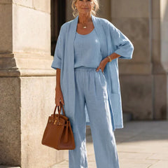Light blue women's elegant set: short-sleeve cardigan over matching wide-leg pants
