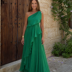 Green one-shoulder maxi dress with layered ruffles and full-length chiffon skirt