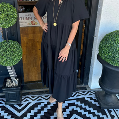 Black tiered maxi dress with short sleeves and V-neck