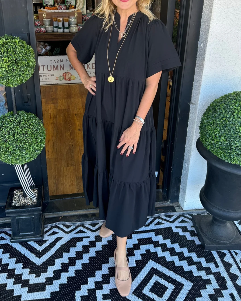 Black tiered maxi dress with short sleeves and V-neck