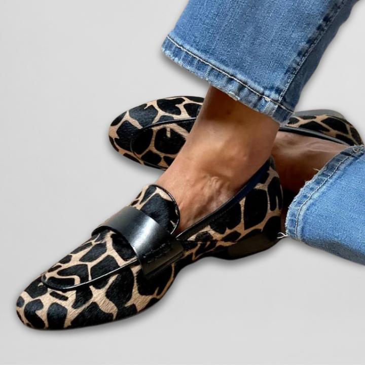 Loafer shoes in leopard-style print with black buckle strap