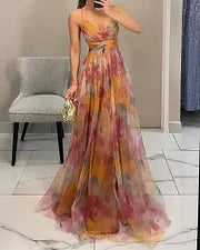 Multi-color halter print maxi dress with flowing tiered skirt, open back