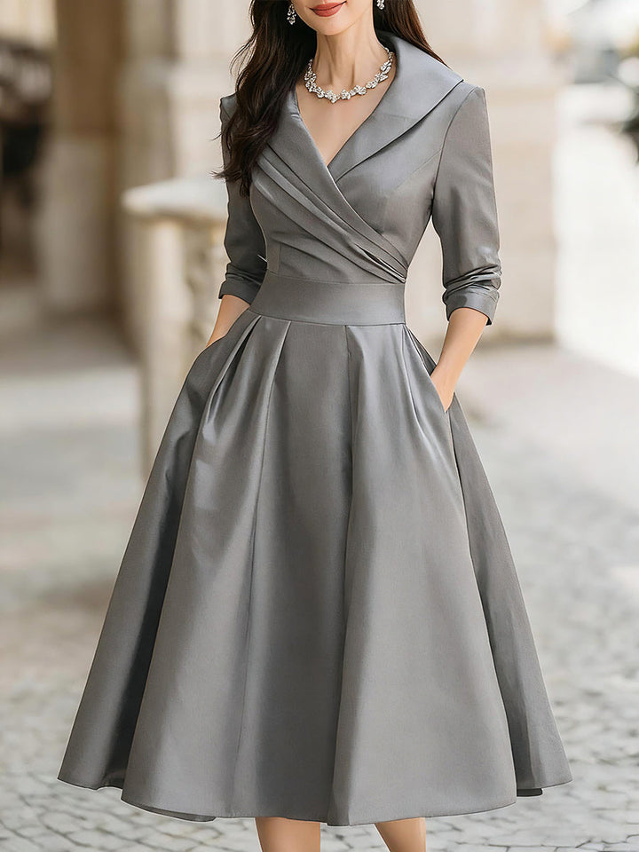 Gray wrap midi dress with V-neck and three-quarter sleeves