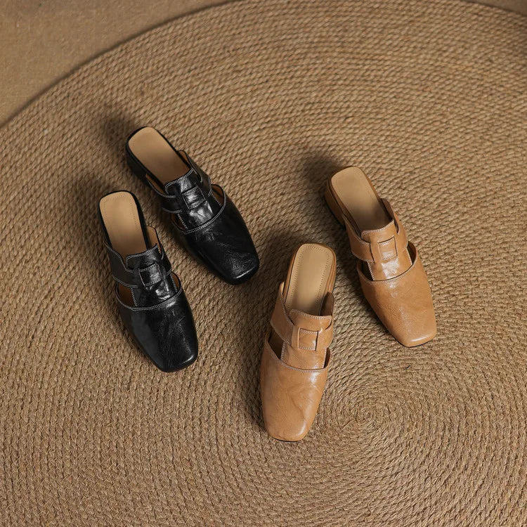 Two leather mules: black pair and apricot pair, crossover straps and block heels