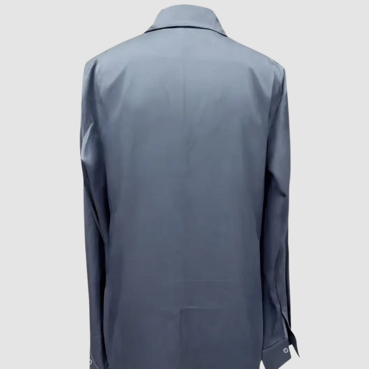 Light blue satin blouse back view with button cuff detail and long sleeves