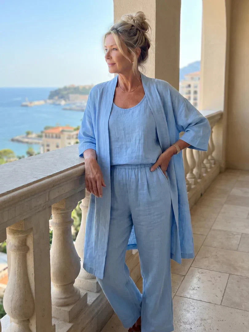 Light blue women's elegant set with draped cardigan and relaxed wide-leg pants