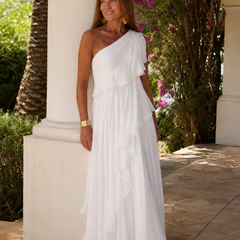 White one-shoulder maxi dress with asymmetrical ruffle detail and chiffon maxi length