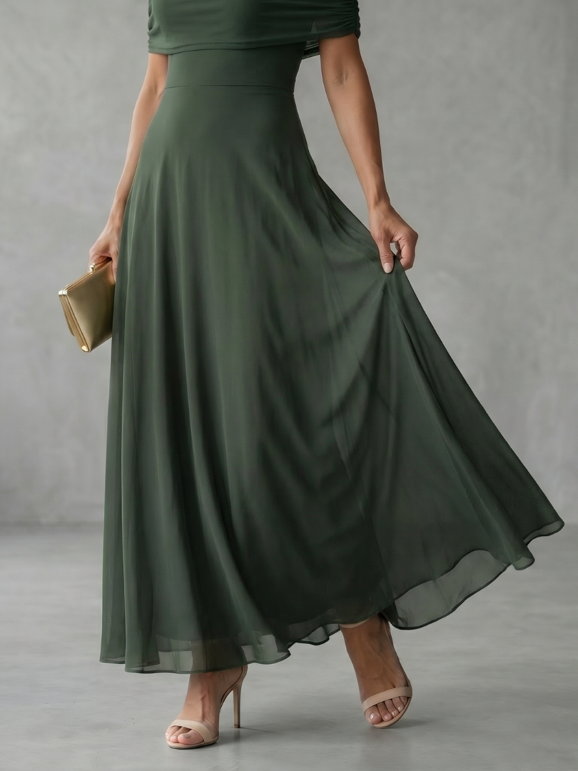 Off-shoulder draped midi dress in dark green, close-up of skirt drape and hem