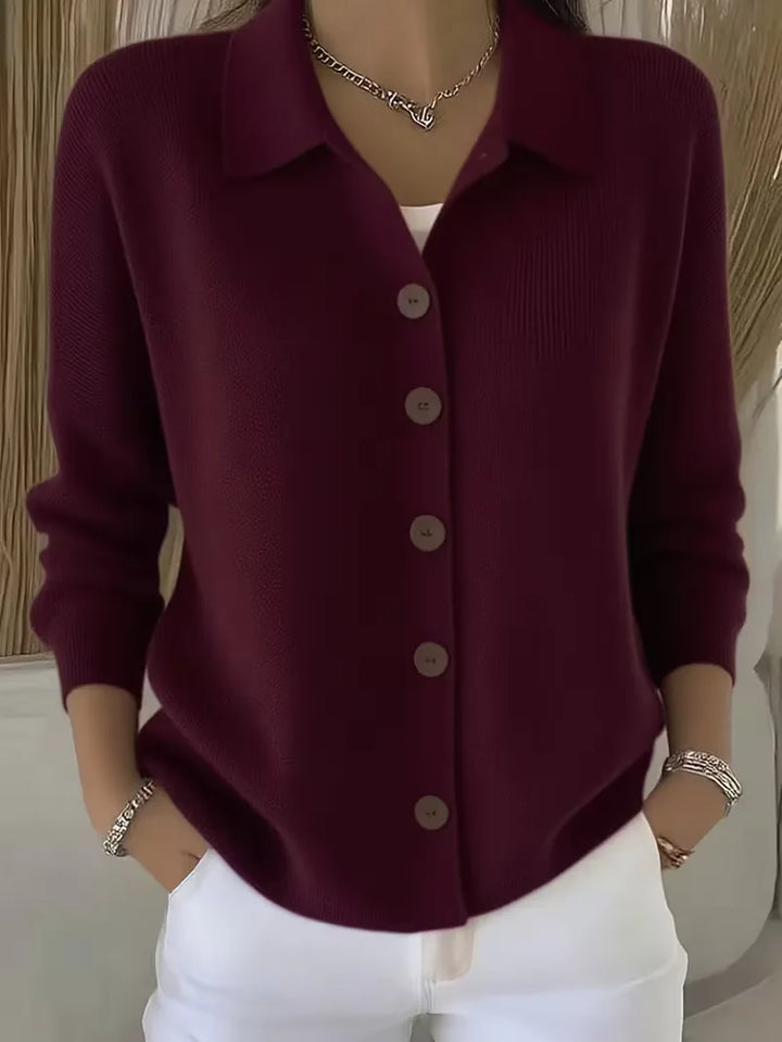 Burgundy button-front knit cardigan with point collar and dark buttons, long sleeves