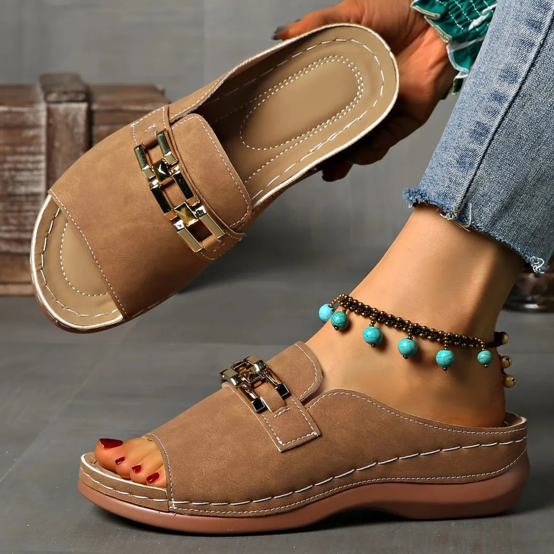 Brown comfort sandals, open toe, gold buckle strap, cushioned sole with stitching