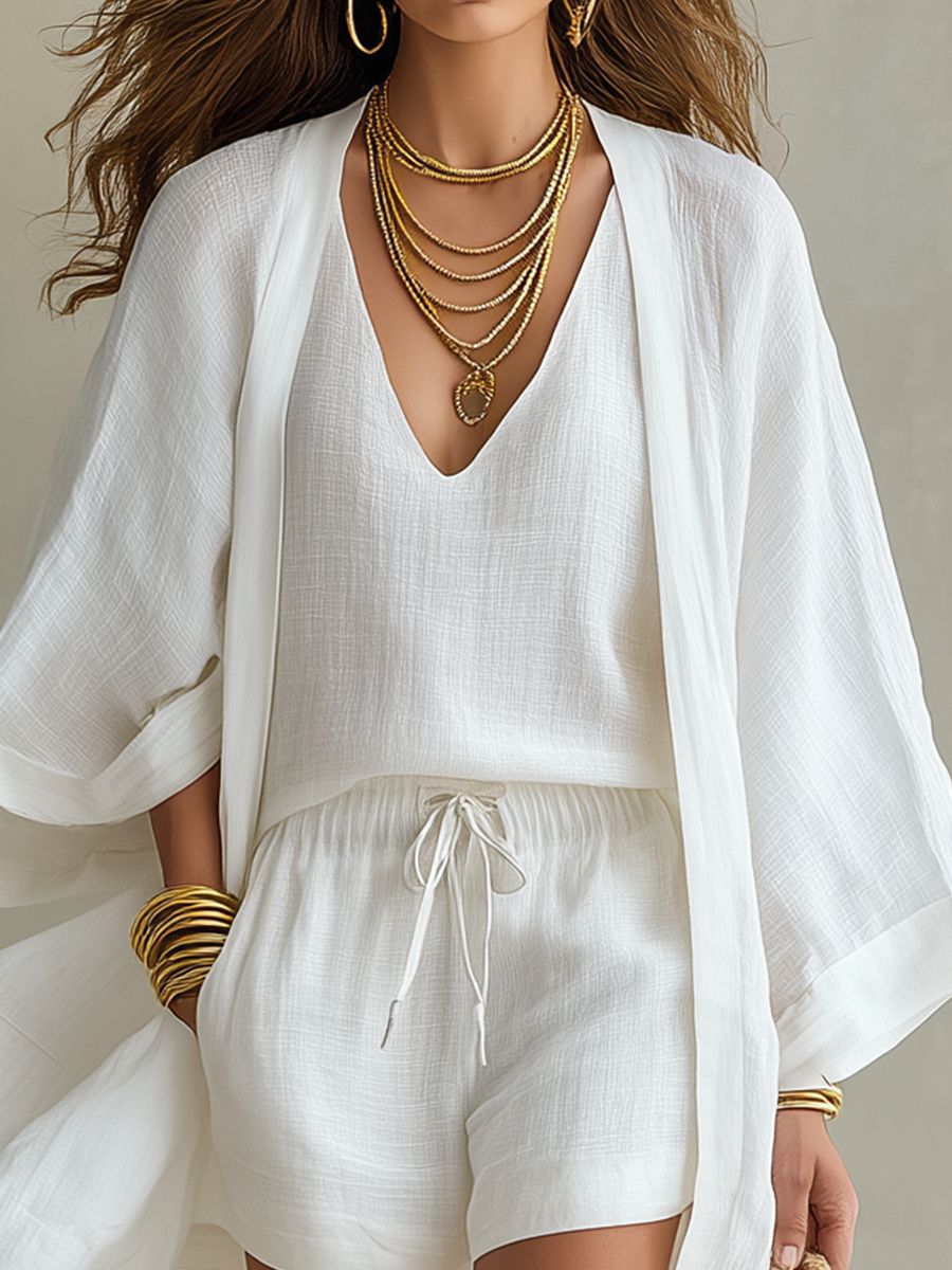 White V-neck top, drawstring shorts, and open kimono-style cover-up set