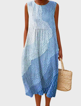 Sleeveless textured midi dress in light blue with draped front panel